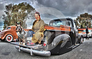 Classic American Pick up truck with woman and her dog