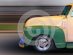 Classic American pickup truck in motion