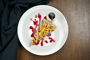 Classic American piece of beef pie with cheddar, cranberry sause and brisket beef on a white plate in a composition with