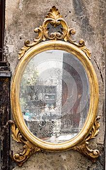 Classic antique mirror with gilded frame