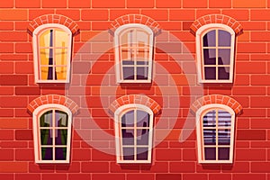Classic arched windows on red brick wall