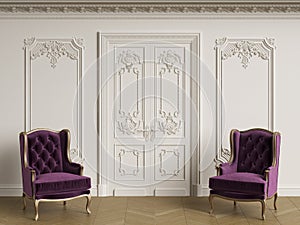 Classic armchais in classic interior. Walls with moldings and de