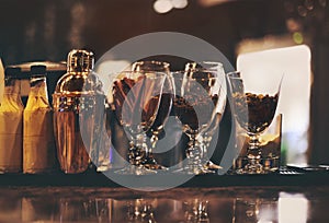 Classic bar counter with bottles in background