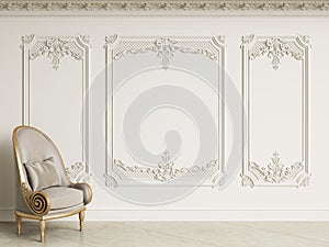 Classic baroque armchair in classic interior. Walls wth moldings and decorated cornic