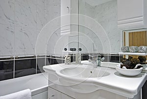 classic bathroom in white with decorative elements