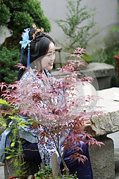 Classic beauty in China, woman in Hanfu dress enjoy free time