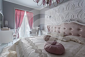 Classic bedroom with double bed, tv
