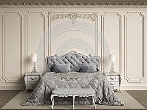 Classic bedroom furniture in classic interior.Walls with mouldings,ornated cornice