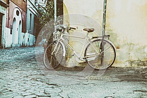 Classic bike leaning against the wall