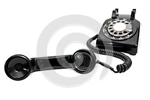 Classic Black Rotary Dial Telephone With Receiver in Focus