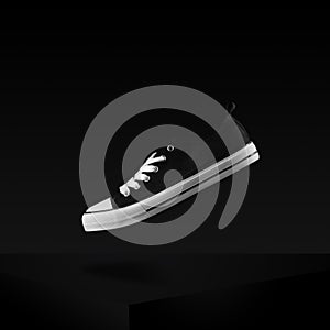 Classic black and white sneaker levitating in air stylish and fashion shot . Shoes on dark background