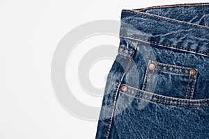 Classic blue jeans front pockets. rough denim texture. jeans on a pure white background. free space for text