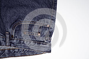 Classic blue jeans front pockets. rough denim texture. jeans on a pure white background. free space for text