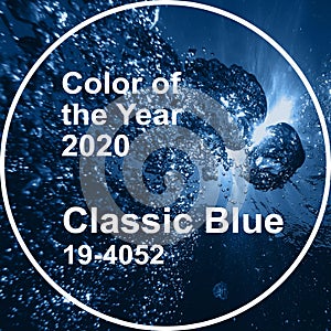 Classic blue main color trend of the Year 2020. Air bubbles at water surface in sea in water