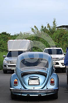 A classic, blue Volkswagen Beetle car