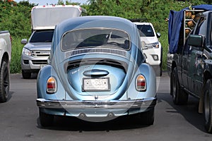 A classic, blue Volkswagen Beetle car