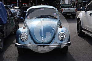 A classic, blue Volkswagen Beetle car