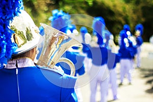 Classic Brass band plays the musical. Musician marching and holding instrument, trumpet, brass tuba and other