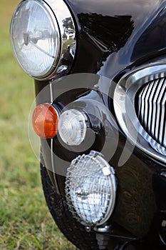 Classic British car headlight and grille