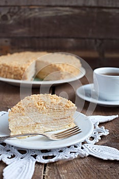 Classic Cake Napoleon of puff pastry with custard cream on a plate