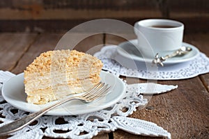 Classic Cake Napoleon of puff pastry with custard cream on a plate