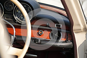Classic car air vents are captured in close up, focusing on their structure and function, proving the system still works