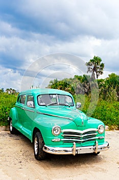 Classic Car at a Beach in Cuba