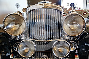 Classic Car Chrome Grille and Headlamps Close-Up at ACD Museum