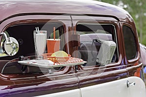 Classic car at drive in movie theater