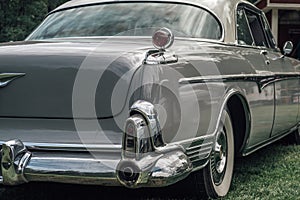 Classic car from the early fifties with lots of chromed moldings