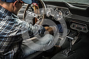 Classic Car Mechanic Inside American Muscle Car