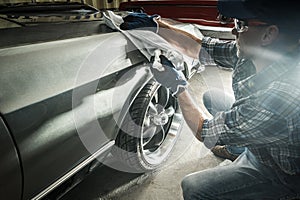 Classic Cars Owner Cleaning His American Muscle Cars