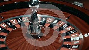 Classic casino roulette on gambling table. Traditional game of chance