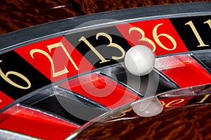 Classic casino roulette wheel with black sector thirteen 13