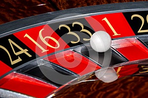 Classic casino roulette wheel with black sector thirty-three 33