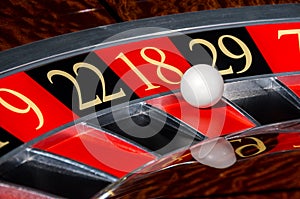 Classic casino roulette wheel with red sector eighteen 18