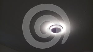 Classic ceiling light with black background.