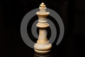 Classic Chess White King on black board, isolated