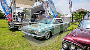 Classic Chevrolet Impala sedan in outdoor car show