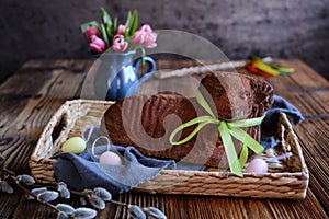 Classic chocolate Easter lamb pound cake sprinkled with cocoa powder
