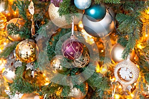 Classic Christmas New Year decorated New year tree with golden ornament decorations toy and ball. Modern white classical style