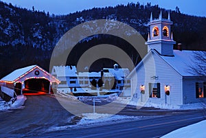 A classic church and covered bridge