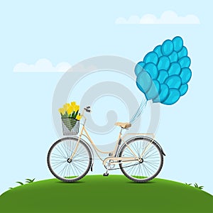 Classic city bicycle, ecological sport transport. Beige women bicycle with metal basket, yellow tulips and balloons attached to tr