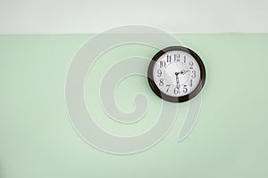 Classic clock on empty wall, Vintage tone