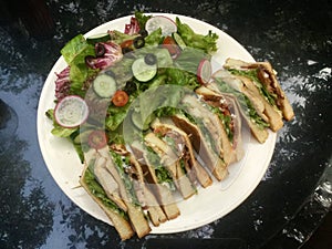 Classic Club Sandwich with fresh salad top