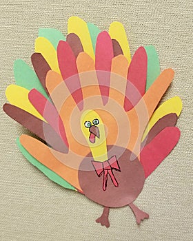 Classic construction paper handprint Thanksgiving arts and crafts holiday project.