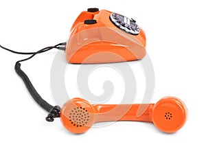 Classic dial phone on white background
