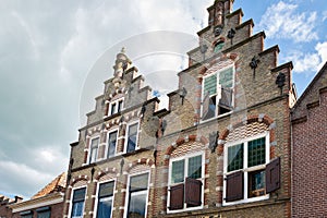 Classic dutch canal houses with blinds or shutters