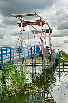 Classic dutch drawbridge over river Rotte, Holland