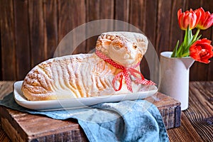 Classic Easter lamb pound cake sprinkled with powdered sugar